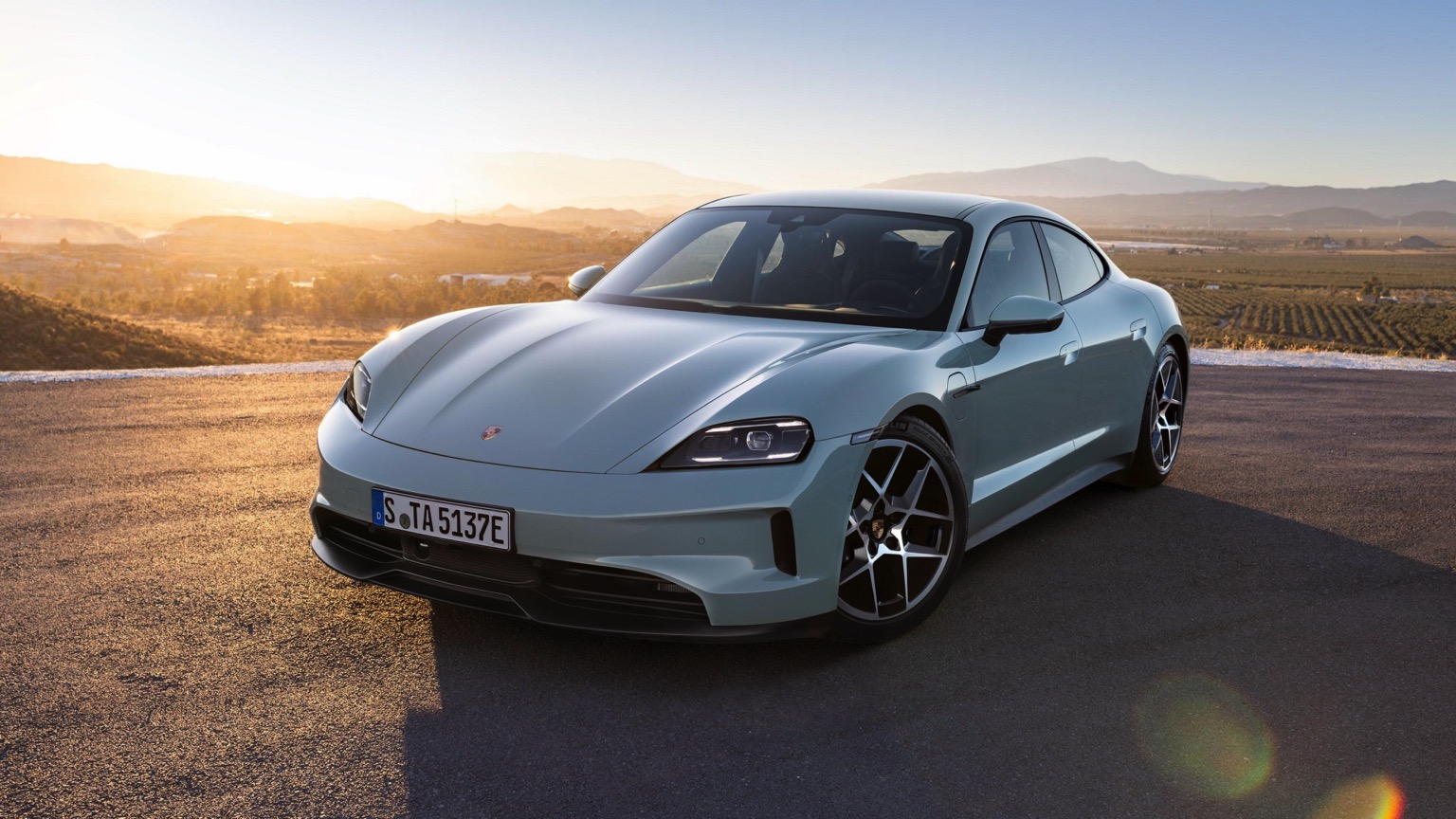 Porsche Taycan 4S showcasing its advanced charging capabilities, illustrating the modern tech appeal for the johnny depp wife